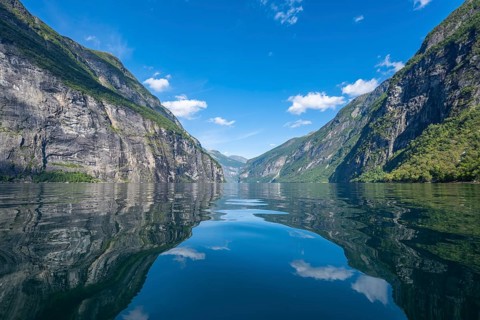 Mountains reflected in the Geirangerfjord