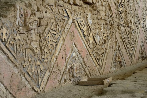 Colourful reliefs of the Moche culture on adobe walls