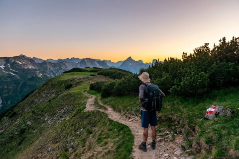 Hiker on hiking trail at Baerenkopf