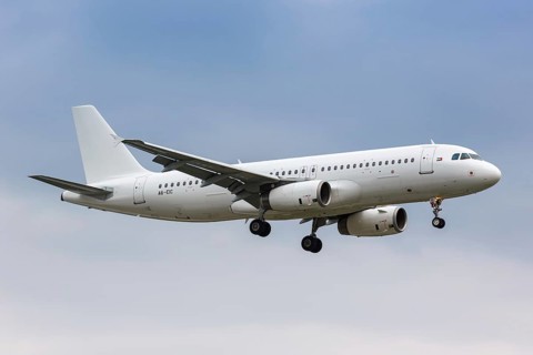 An Etihad Airways Airbus A320 with registration A6-EIC lands at London Heathrow Airport