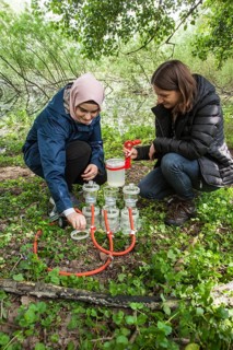 Scientists of the working group of Prof. Dr. Jens Boenigk of the University of Duisburg-Essen filtering water samples near Grietherbusch on the Lower Rhine