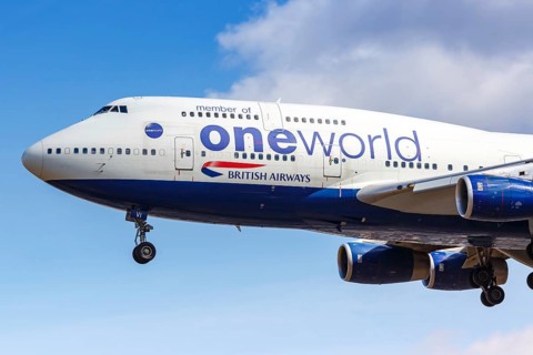 A British Airways Boeing 747-400 aircraft with registration number G-CIVI and special livery OneWorld at London Heathrow Airport
