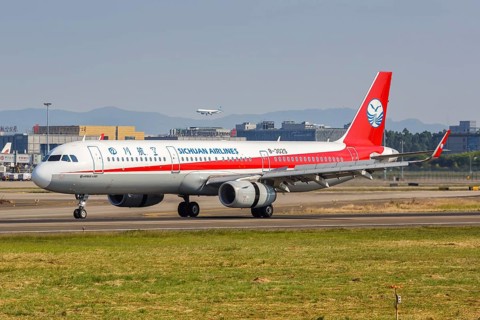 An Airbus A321 aircraft of Sichuan Airlines with registration number B-302S at Guangzhou airport