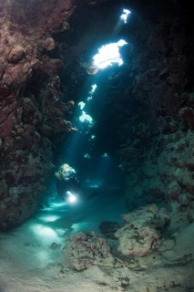 Diver in underwater cave
