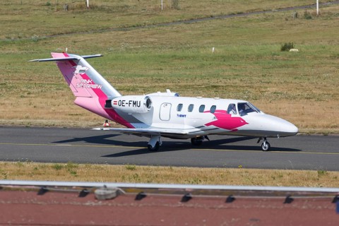 A Cessna 525 CitationJet 1 aircraft of the Pink Sparrow with registration OE-FMU at Dortmund Airport
