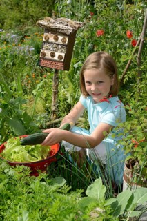 Girl with cucumber