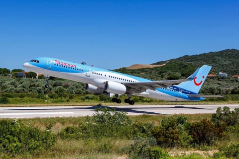 A Boeing 757-200 of Thomson Airways with the registration G-OOBB at Skiathos Airport