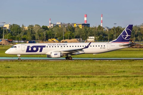 An Embraer 195 of LOT Polskie Linie Lotnicze with registration SP-LNM at Warsaw Airport