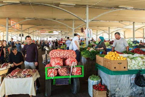 Market stand with vegetables and meat