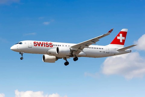 A Swiss Airbus A220-300 with the registration HB-JCM lands at London Heathrow Airport