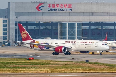 A Boeing 787-9 Dreamliner aircraft operated by Juneyao Air with registration number B-209R at Shanghai Airport