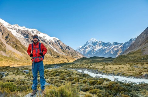 Hiker standing on a rock