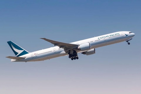 A Cathay Pacific Boeing 777-300ER aircraft with registration B-KQD at Hong Kong Airport