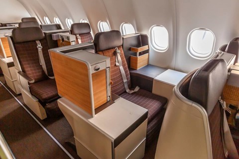 Business Class cabin of an Airbus A340-300 aircraft of Swiss at Zurich Airport