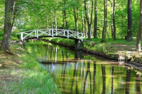 Bridge over the moat in the park of Hermsdorf Castle