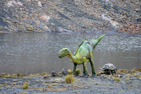 Life-size figures of dinosaurs at the highest site in the world