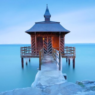 Iced bathhouse at dawn