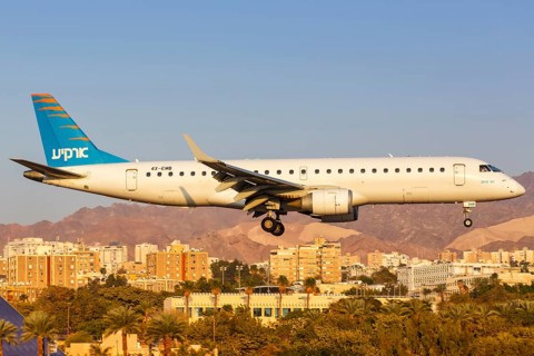 An Arkia Embraer 190 with registration number 4X-EMB lands at Eilat Airport