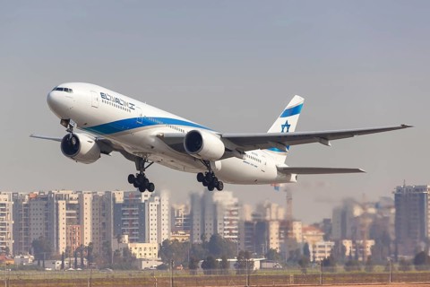 A Boeing 777-200ER aircraft of El Al Israel Airlines with registration number 4X-ECB takes off from Tel Aviv Airport
