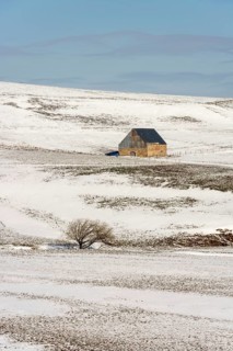 Farm in winter in Cezallier massif