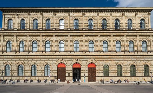 People sunbathing in front of the Residenz
