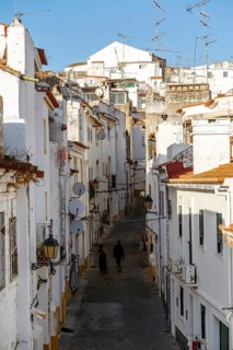Narrow street between whitewash houses of fortified Elvas