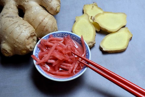 Pickled ginger in small bowls and ginger slices