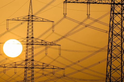 Power pylons at sunset