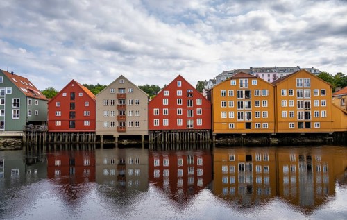Colourful historic warehouses by the river Nidelva
