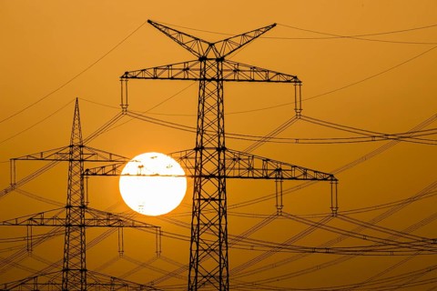 Power pylons at sunset
