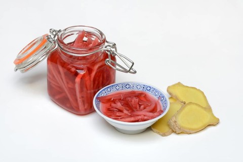 Pickled ginger in glass and peel