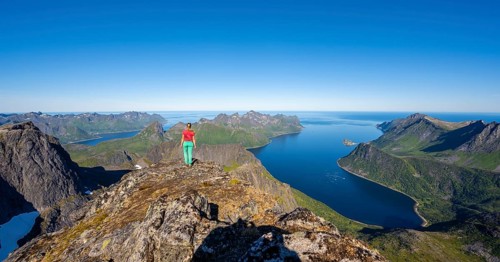 Hiker standing on top of Grytetippen