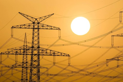 Power pylons at sunset