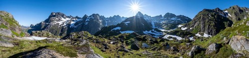 Sun shining on mountain panorama