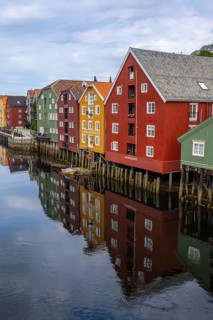 Colourful historic warehouses by the river Nidelva