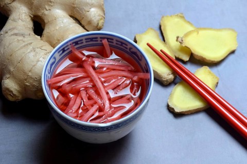 Pickled ginger in small bowls and ginger slices