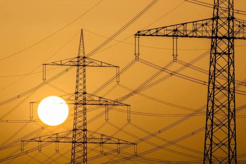 Power pylons at sunset