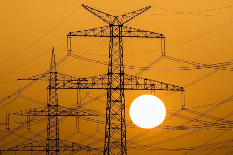 Power pylons at sunset