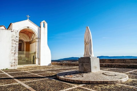 Monument of queen Saint Isabela next to church of Saint Mary
