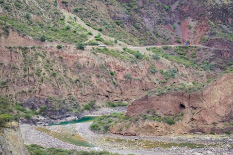 Coach and truck above the gorge of the Rio Mantaro