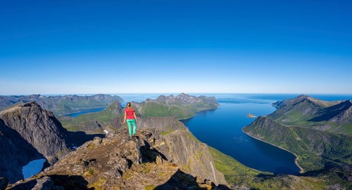 Hiker standing on top of Grytetippen