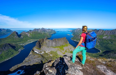 Hiker standing on top of Grytetippen