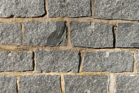 Wall of granite stones