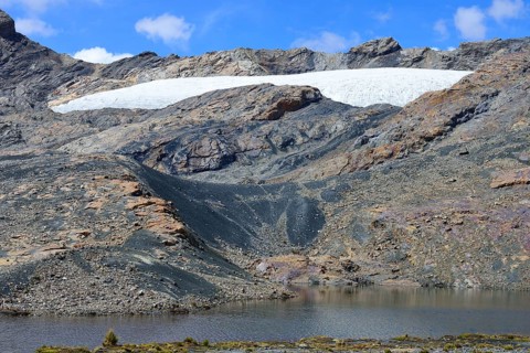 Scree between glacier Pastoruri and lake