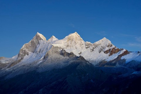 Mountain massif of Nevado Huandoy at dawn