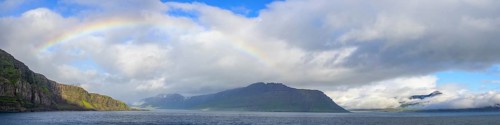 Rainbow at the entrance to the fjord of