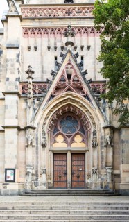 Neo-Gothic west portal of the Thomaskirche Leipzig