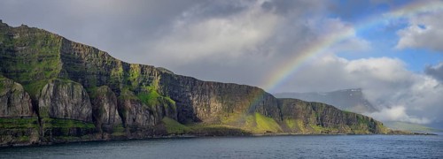 Rainbow at the entrance to the fjord of