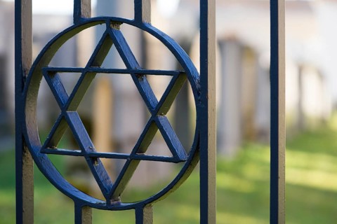 Star of David in the entrance gate of the historical Jewish cemetery