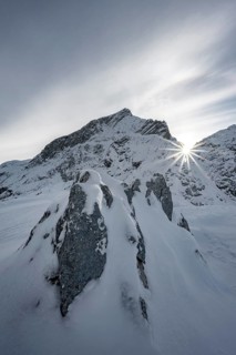 Snowy Alpspitze with sun star